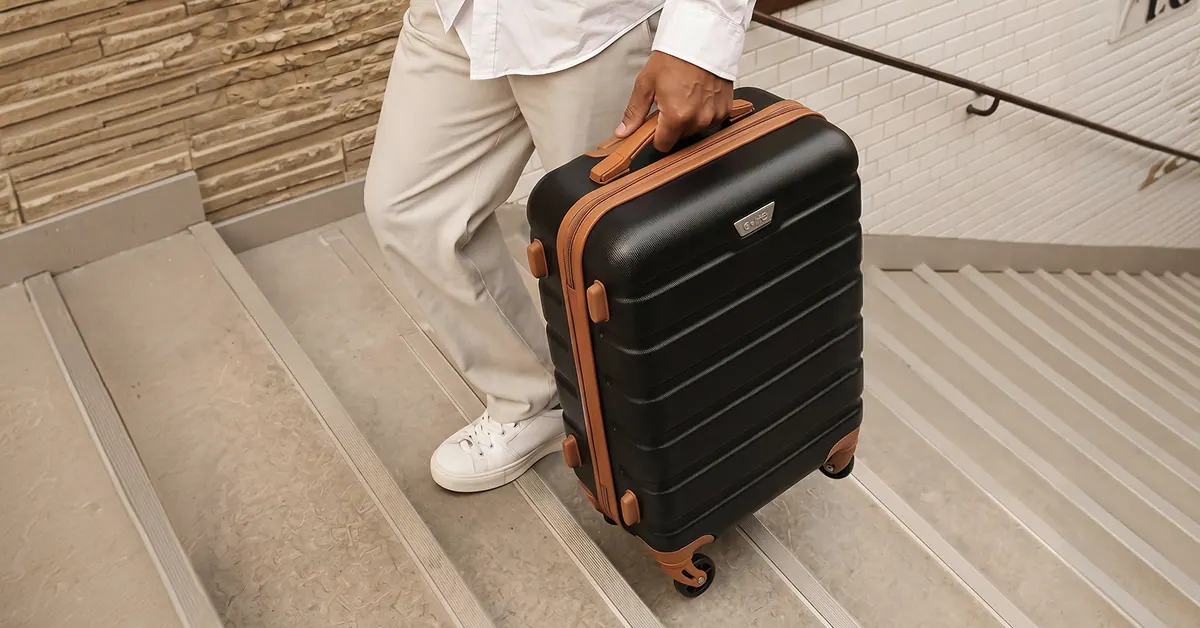 Coolife hardshell spinner luggage carried on stairs