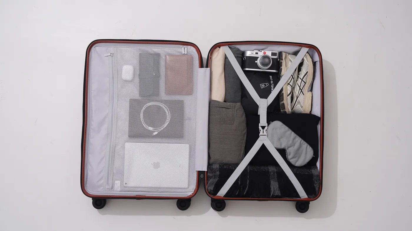 Coolife upgraded durable PC luggage shown with packing context